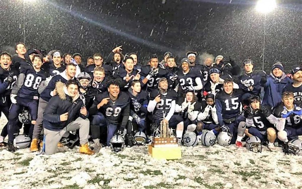 The Saint Paul Patriot’s football team celebrates their Niagara high school football championship. The team now heads to Ottawa to play in the Golden Horseshoe Bowl.