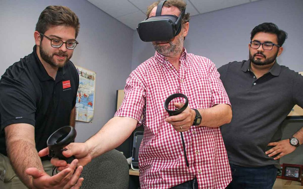 Professor Martin Danahay through the controls used to navigate a new 3D classroom