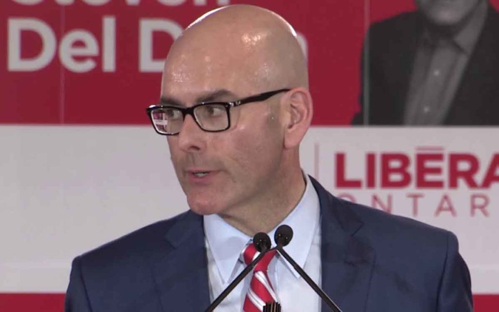 Stephen Del Duca at the mic