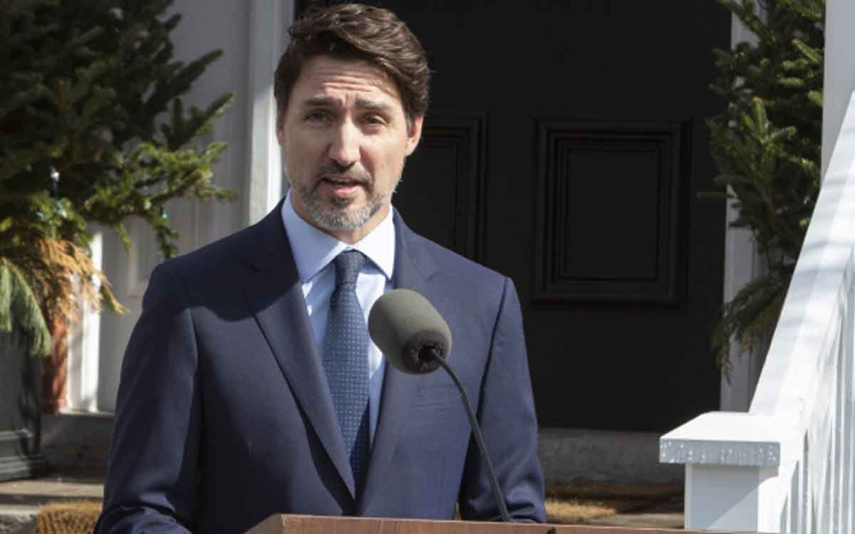 PM Trudeau at a podium during an announcement