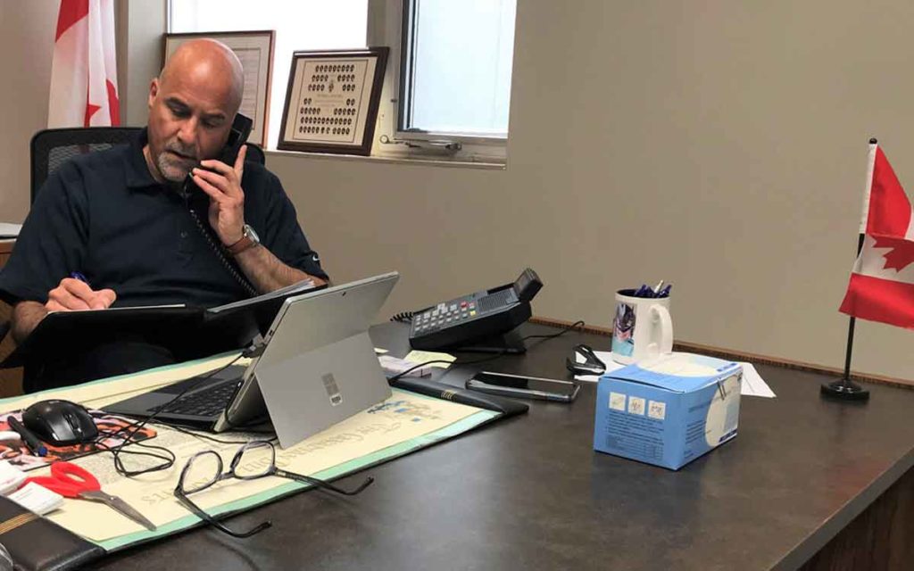 Niagara Falls MP Tony Baldinelli on the phone