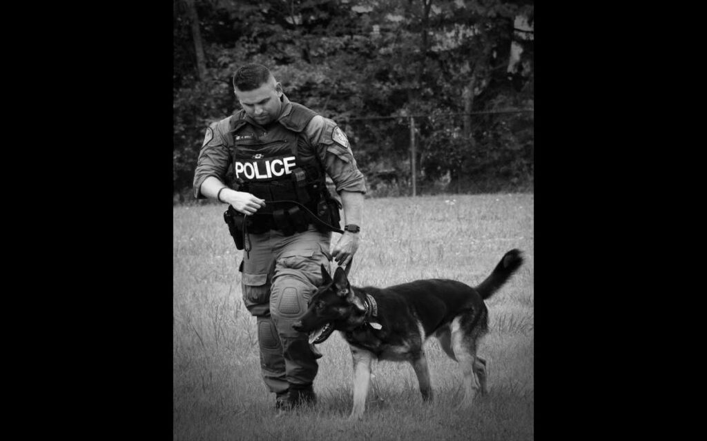 Officer Tim Wiley with his partner Rudy