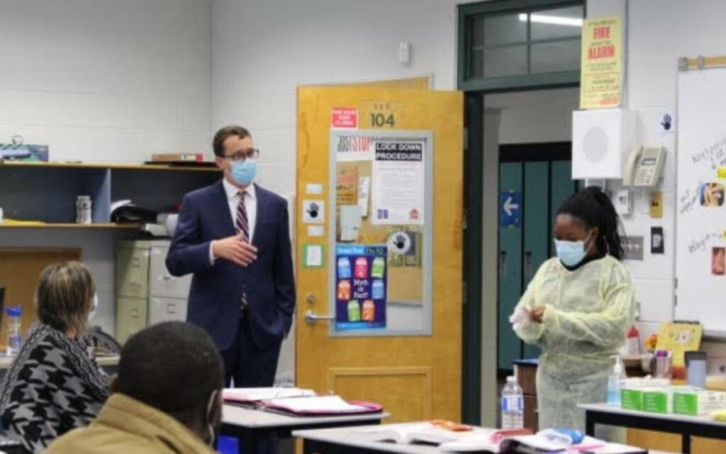 Minister McNaughton in a classroom