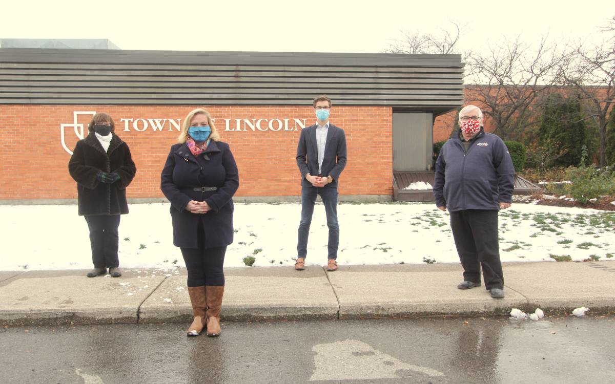 politicians in front of west lincoln town hall
