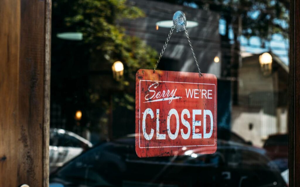 closed sign on window