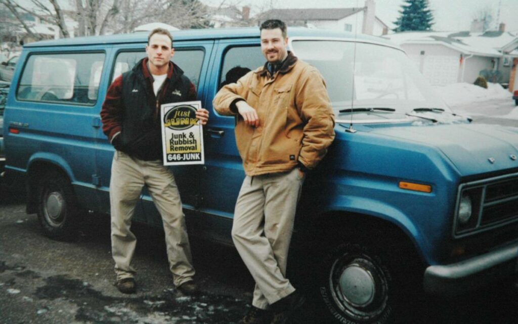 Mike Throne in front of a blue van