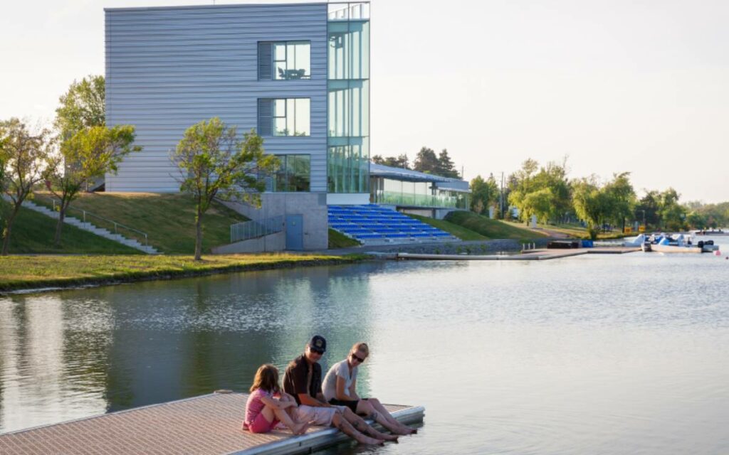 people sitting on the dock at the Welland International Flatwater Centre