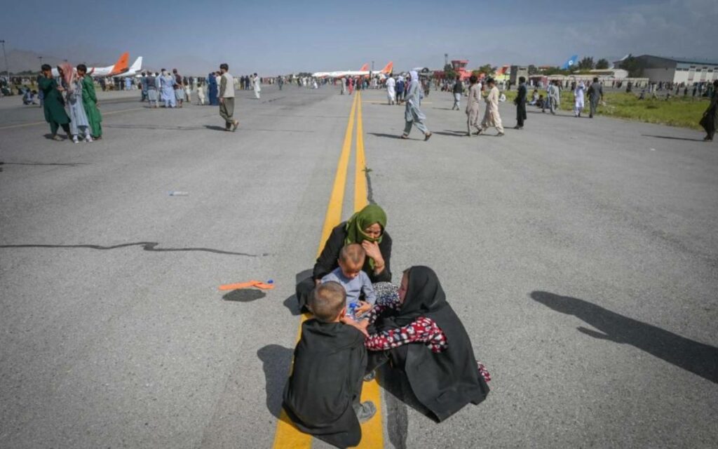 people on the airport runway