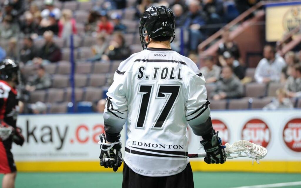 Steve Toll playing lacrosse
