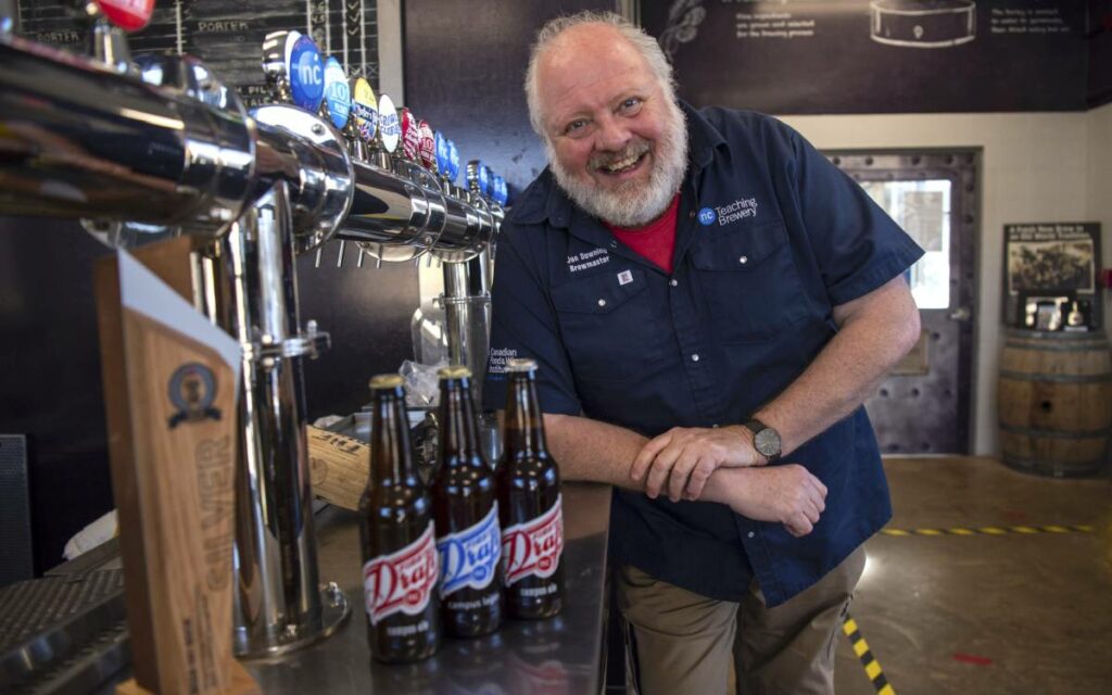 Jon Downing  standing in the NC brewery